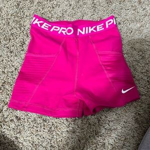 hot pink nike pro shorts